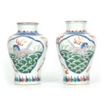 A PAIR OF 19th CENTURY CHINESE WUCAI MEI PING VASES painted with horses and banded decoration 19.5cm