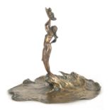 A LATE 19TH CENTURY AUSTRIAN ART NOUVEAU BRONZE FIGURE of a Mermaid holding a raised shell rising