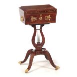 A REGENCY BRASS INLAID ROSEWOOD TEAPOY the moulded-edge top with lyre shaped inlays and side handles