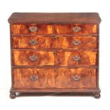 AN EARLY 18TH CENTURY FIGURED WALNUT AND OAK CHEST OF DRAWERS the moulded edge top above two small