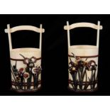 A PAIR OF JAPANESE MEIJI PERIOD IVORY AND ENAMEL BUCKET SHAPED VASES with moulded brightly