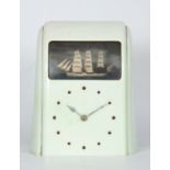 AN ART DECO VITASCOPE BAKELITE ELECTRIC AUTOMATION MANTLE CLOCK the mint green case having