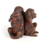 A LATE 19TH CENTURY ORIENTAL FINELY CARVED BOXWOOD SEATED TRIPLE MONKEY GROUP - see, speak and
