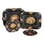 A SELECTION OF FOUR 19TH CENTURY TOLEWARE TRAYS decorated with gilt work edges centralised by