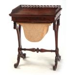 A 19TH CENTURY FIGURED WALNUT WORKBOX IN THE MANNER OF GILLOWS with pierced fretwork top above a