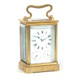 A LATE 19TH CENTURY SWISS STRIKING AND REPEATING CARRIAGE CLOCK WITH CALENDAR the brass moulded case