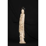 A LARGE 19th CENTURY CHINESE CARVED IVORY SCULPTURE modelled as a standing maiden holding a basket