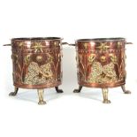 A PAIR OF 19TH CENTURY DUTCH COPPER AND BRASS LOG BUCKETS the riveted cylindrical bodies mounted