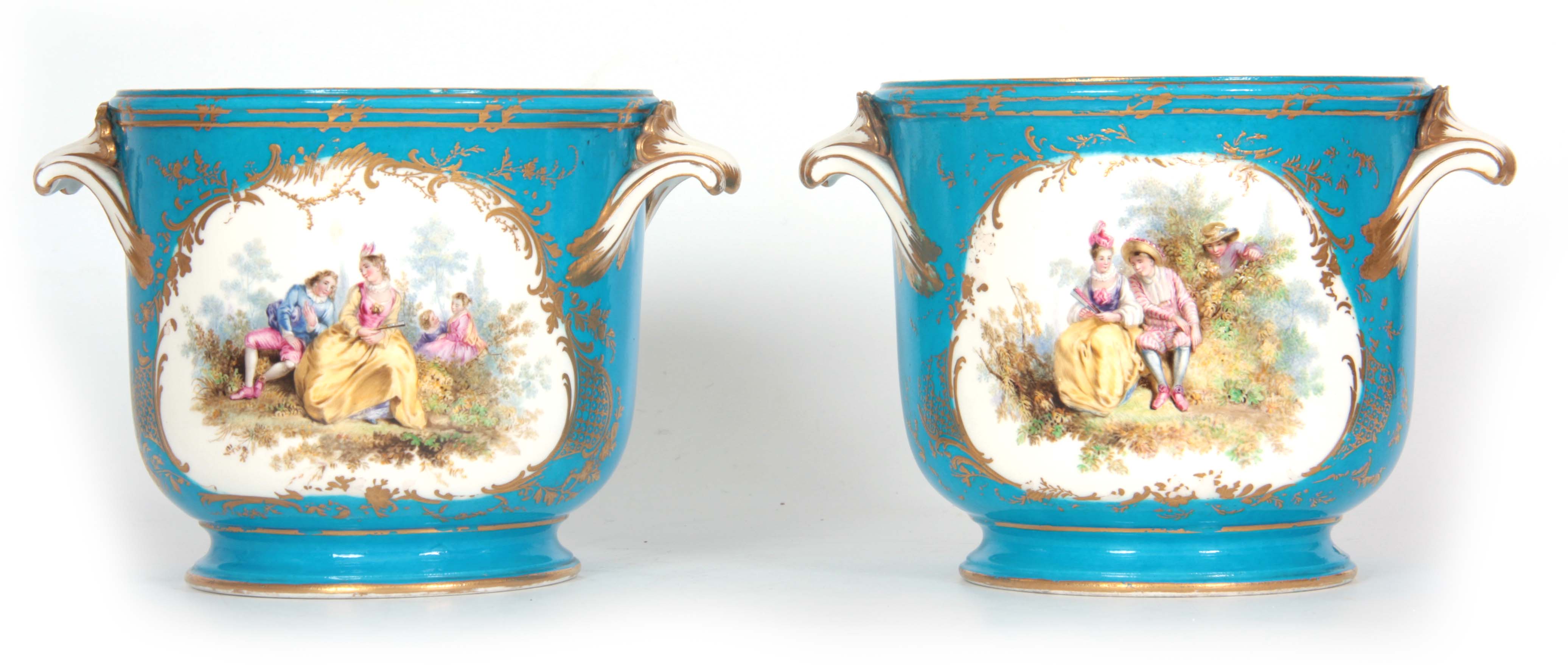 A PAIR OF 19TH CENTURY SEVRES PATTERN LARGE TWO-HANDLED JARDINIERES with gilt-edged leaf work