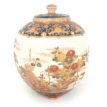 AN IMPERIAL SATSUMA KORO AND COVER of bulbous rectangular form decorated in gilt, rust red and