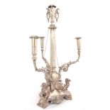 A 19TH CENTURY SILVER PLATED NICKEL CANDELABRA The tri-form figural stand with three recumbent