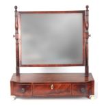 A GEORGE III BOXWOOD AND ROSEWOOD CROSS-BANDED MAHOGANY TOILET MIRROR with a rectangular mirror