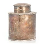 A VICTORIAN OVAL SILVER TEA CANISTER WITH PULL-OFF COVER of plain design with rope twist borders