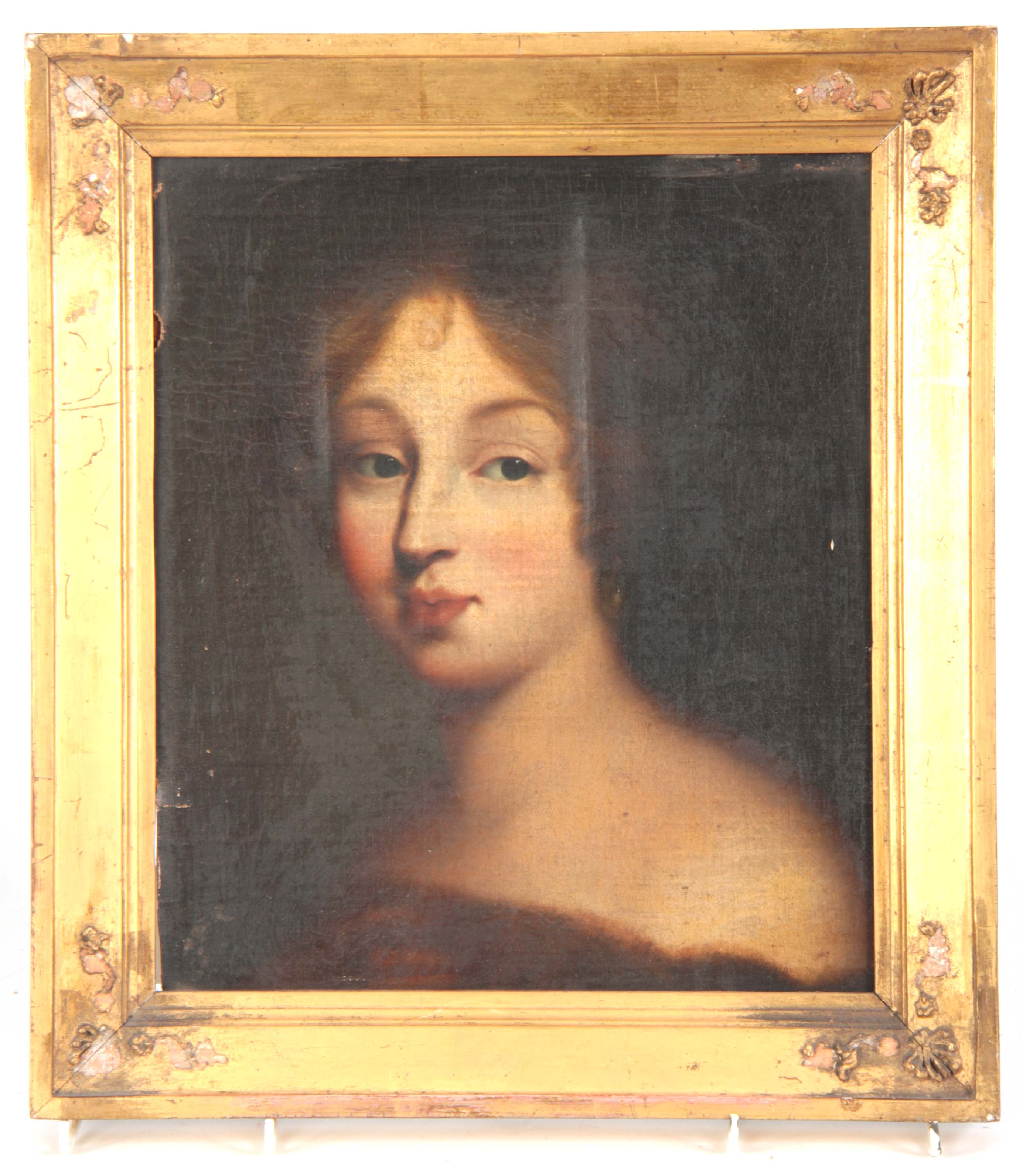 AN 18TH CENTURY OIL ON CANVAS. Portrait of a young woman with exposed shoulders and long brown