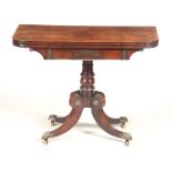 A REGENCY BRASS INLAID ROSEWOOD CARD TABLE with fluer-de-ley inlaid corners to the top revealing a