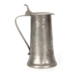 A LARGE 18TH CENTURY PEWTER LIDDED FLAGON of tapered form with banded decoration and impressed marks