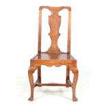 AN 18TH CENTURY ELM AND OAK SINGLE SIDE CHAIR with vase-shaped back splat above a panelled seat;