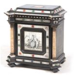 A 19TH CENTURY ITALIAN EBONY, IVORY INLAID AND HARDSTONE SET TABLE CABINET the chamfered top above a