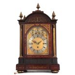 A LATE 19TH CENTURY ROSEWOOD BRASS INLAID EIGHT BELL QUARTER CHIMING BRACKET CLOCK the arched top