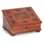 A 19TH CENTURY CONTINENTAL WALNUT AND ROSEWOOD INLAID DEED / WRITING BOX the hinged angled lid