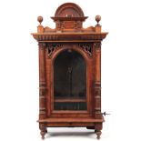 A LATE 19TH CENTURY GERMAN 'PENNY IN THE SLOT' POLYPHON with arched removable pediment above a