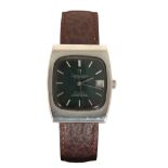 A 1960's STEEL OMEGA CONSTELLATION AUTOMATIC WRIST WATCH on a brown leather strap, having a green