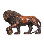 A 19TH CENTURY VARI-COLOURED CAST BRONZE SCULPTURE OF A MEDICI LION well modelled and patinated with