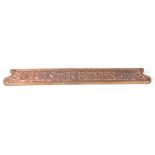 A LARGE ARTS AND CRAFTS HAMMERED AND EMBOSSED COPPER CHEMISTS SIGN for 'J. AUSTIN BAYES, M.P.S.'