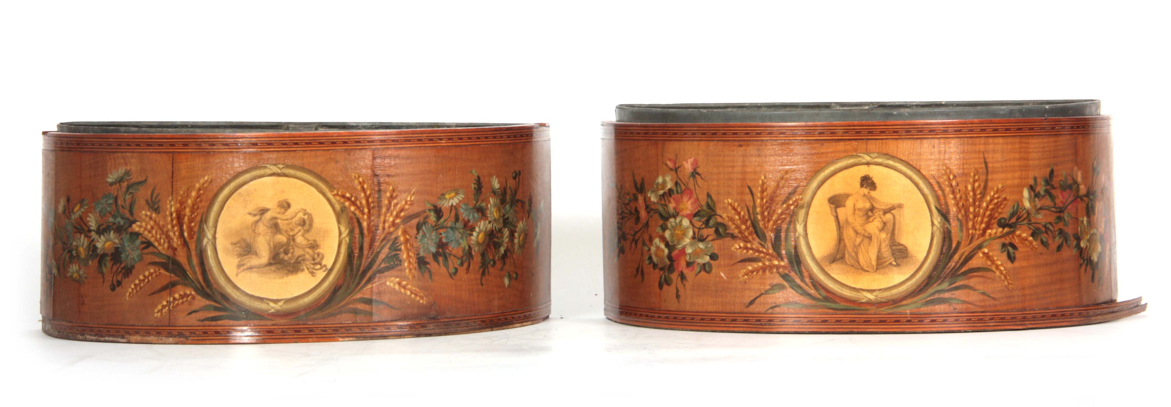 A PAIR OF GEORGE III SHERATON STYLE DEMI LUME PAINTED HAREWOOD BOUGH POTS with classical circular