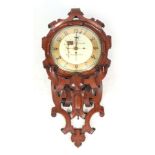 G & J HAMMOND, MANCHESTER AN UNUSUAL GOTHIC OAK TRIPLE FUSEE WALL CLOCK the carved case of