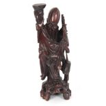 A 19TH CENTURY CHINESE CARVED HARDWOOD STANDING MALE FIGURE 54.cm high