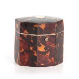 A SMALL 19TH CENTURY OCTAGONAL TORTOISESHELL VENEERED TEA CADDY with slightly domed hinged top and