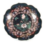 A JAPANESE MEIJI PERIOD CLOISONNE ENAMEL CHARGER with a shaped scalloped edge, having blue and