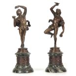 A PAIR OF 19TH CENTURY FRENCH CLASSICAL BRONZE FIGURES mounted on circular veined green marble bases