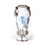 AN ART NOUVEAU FRENCH PORCELAIN AND SILVER OVERLAY VASE the porcelain decorated with a blue transfer
