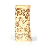 A FINELY CARVED CHINESE IVORY TUSK VASE with a pierced body and scrolling dragons 21.5cm high