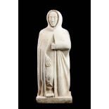 AN EARLY MEDIEVAL STYLE FRENCH CARVED LIMESTONE STATUE OF A HOODED LADY 103cm high.