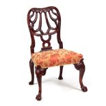 AN EARLY 18TH CENTURY STYLE WALNUT SIDE CHAIR IN THE MANNER OF GILES GRENDY with rococo shell-shaped