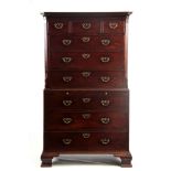 A GEORGE III MAHOGANY CHEST ON CHEST with canted reeded corners and brushing slide fitted three