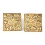 A PAIR OF 19TH CENTURY SQUARE BRASS HANGING PANELS with high relief embossed flower head and leaf