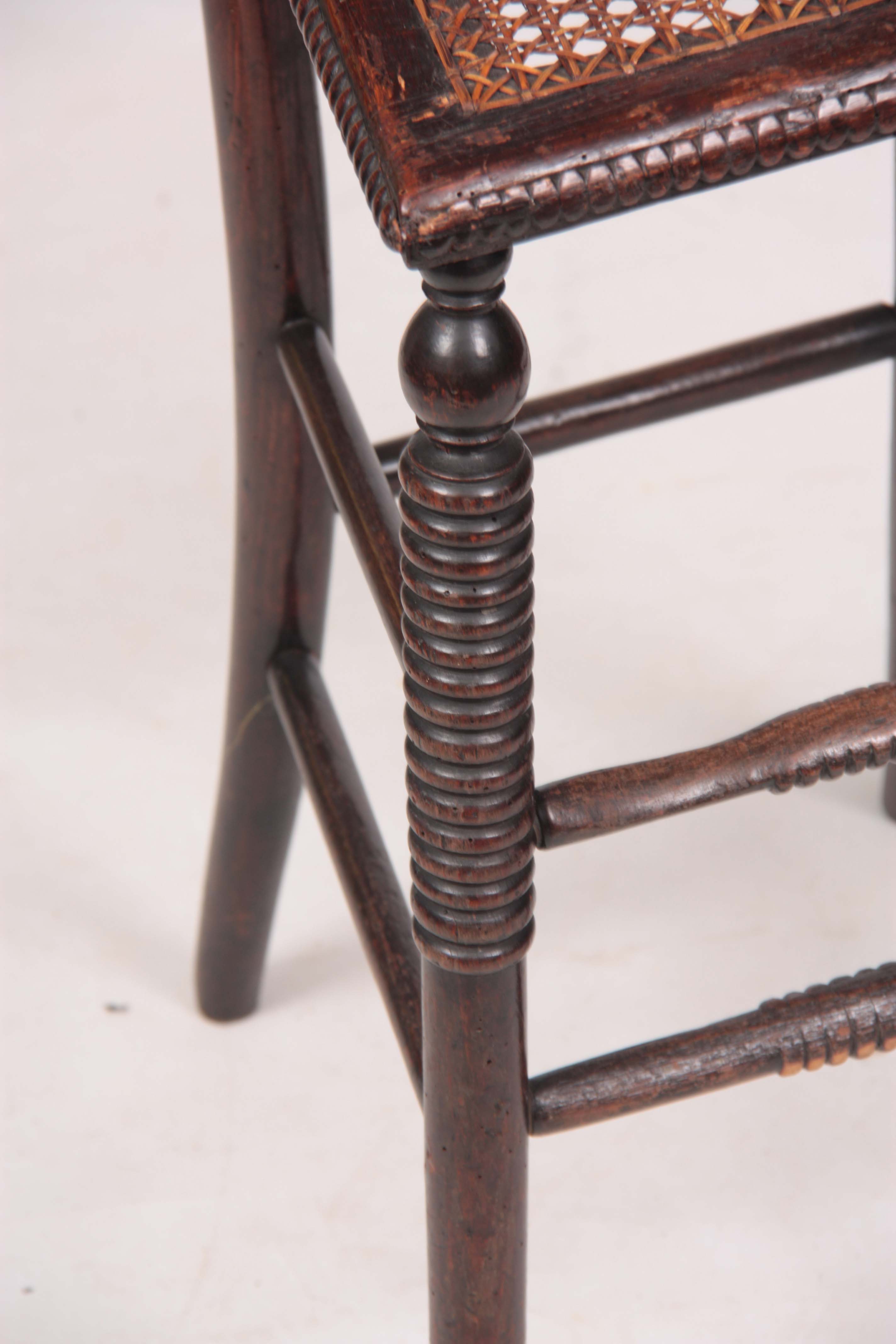 A 19TH CENTURY LATE REGENCY SIMULATED ROSEWOOD STAINED BEECH CHILD'S CORRECTION CHAIR with lyre- - Image 3 of 5