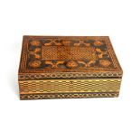 A LATE GEORGE III PENWORK BOX the hinged lid with woven design panel to the centre surrounded by