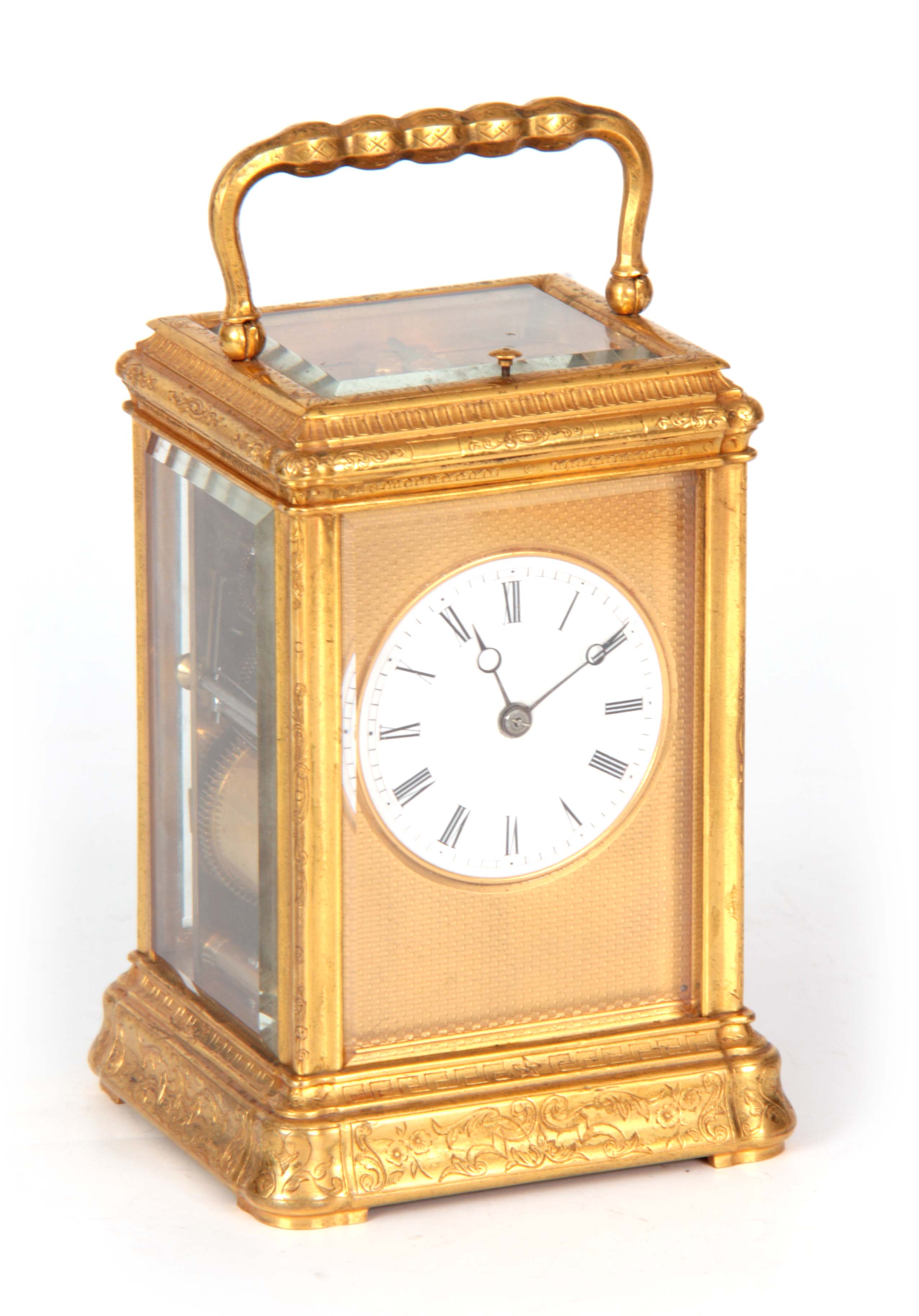 A 19TH CENTURY FRENCH GILT BRASS ENGRAVED GORGE CASE CARRIAGE CLOCK REPEATER with folding handle and