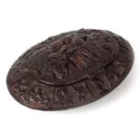 AN 18TH CENTURY CARVED COCONUT OVAL SNUFF BOX with classical figures, animals and foliage decoration