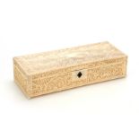 A FINE 19TH CENTURY ORIENTAL CARVED IVORY GLOVE BOX intricately carved all round with domestic and