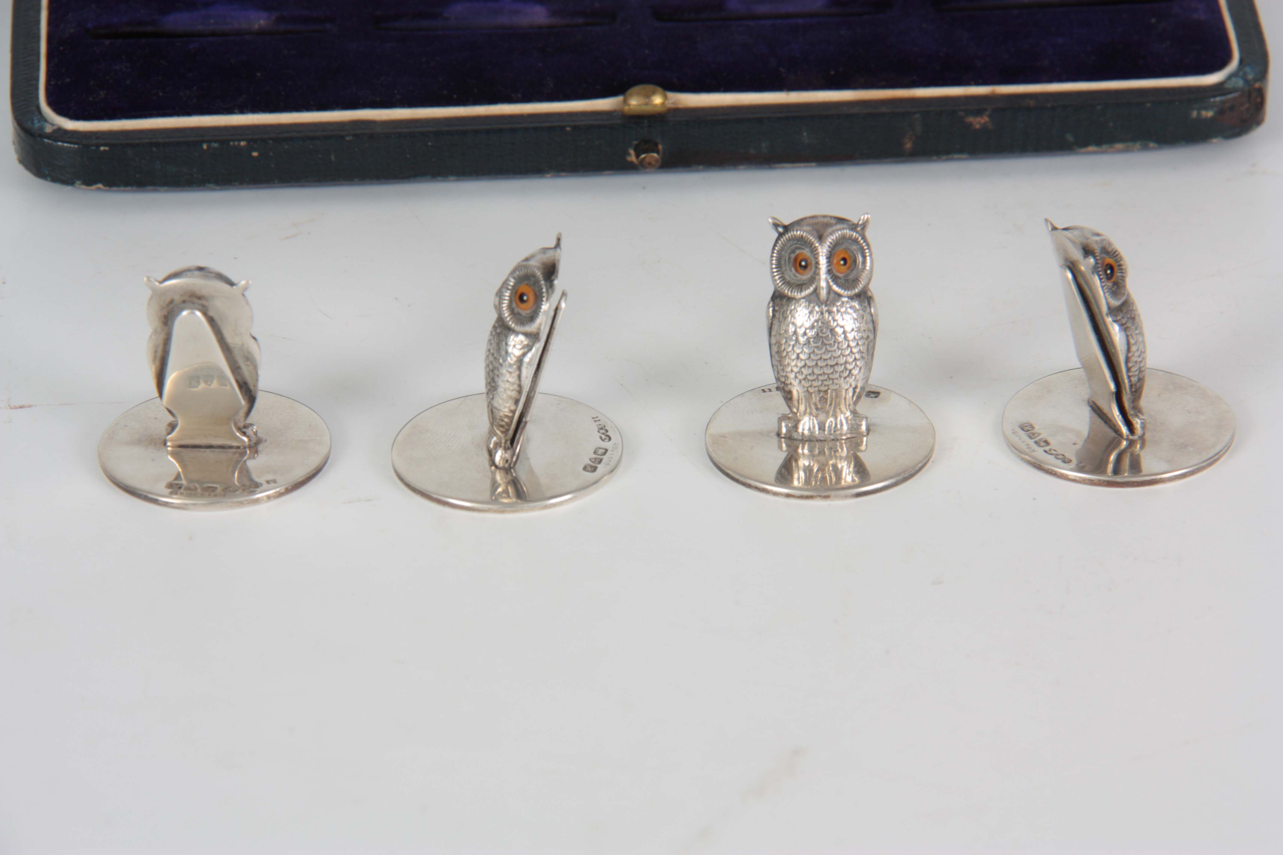 AN EDWARD VII CASED SET OF FOUR NOVELTY SILVER MENU HOLDERS modelled as owls, having amber set - Image 3 of 4