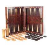 A FINE MID 18TH CENTURY GERMAN IVORY INLAID KINGWOOD TRAVELLING BACKGAMMON / GAMES BOARD the