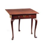 A GEORGE I MAHOGANY SIDE TABLE with drop-down hinged back above a gated back leg and single frieze