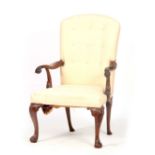 AN 18TH CENTURY AND LATER MAHOGANY OPEN ARM CHAIR OF IRISH DESIGN with buttoned arched back and