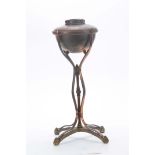 AN ART NOUVEAU COPPER AND BRASS OIL LAMP BY W A S BENSON with stylised shaped base and copper